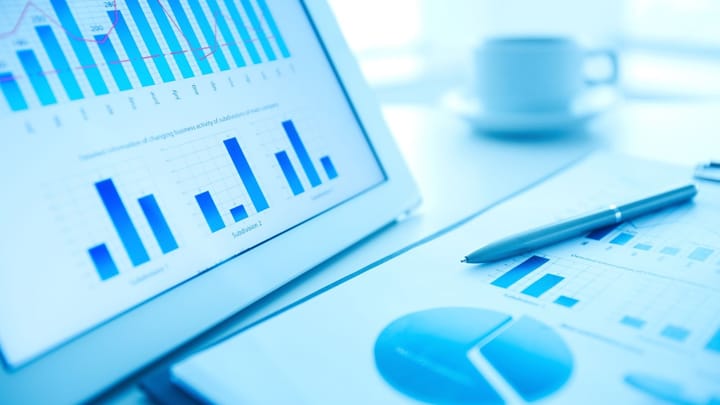 Financial Analysis on a screen with histograms